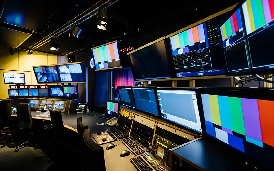 Primestar broadcast control room with multi-view monitor wall